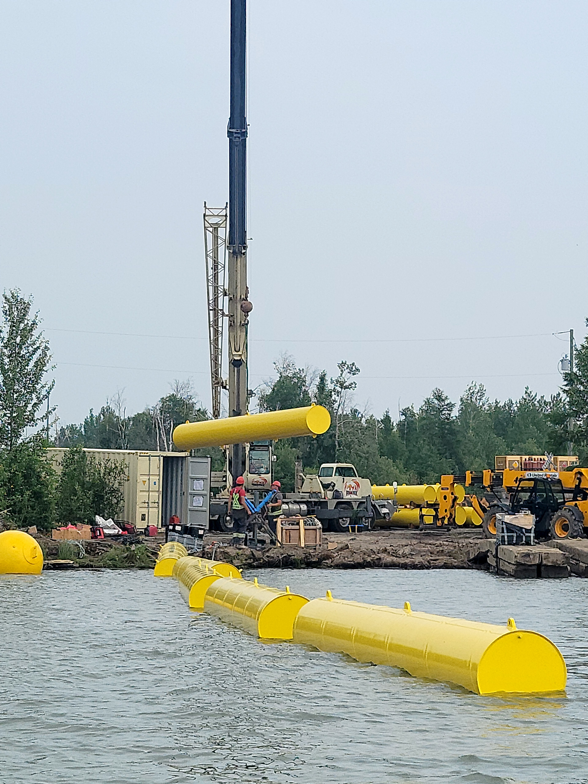 Craning Waterway Barrier Boom Sections