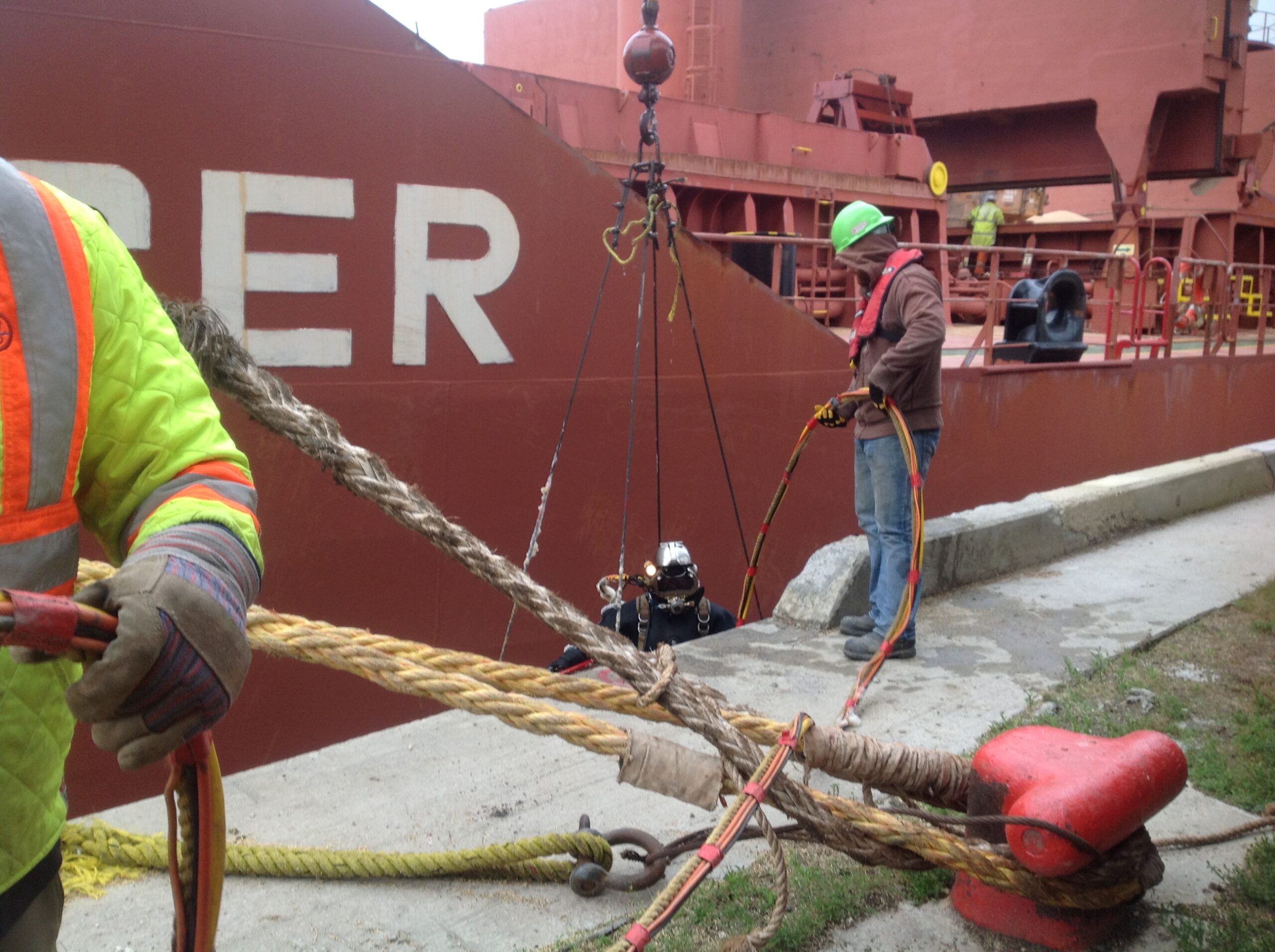 Diver preparing to carry out a repair on a ship's hull.