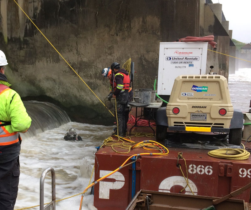 Diver carrying out concrete repairs to the rollway.