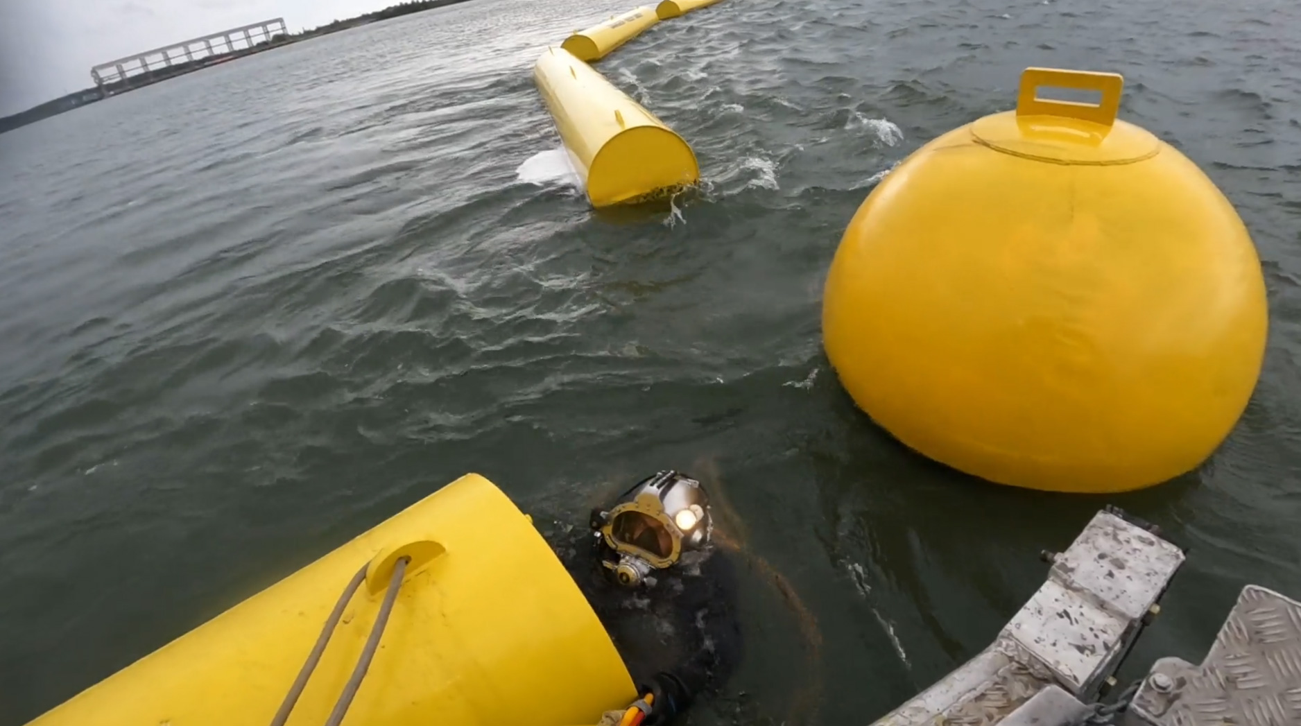 Diver preparing to check in-water anchors